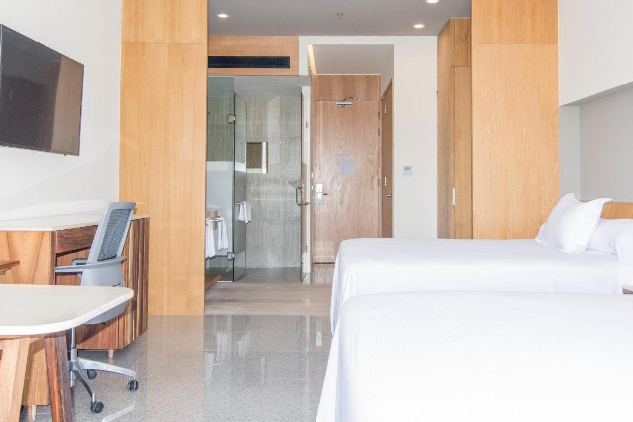 Hotel Mio Vallarta Unique & Different- Adults Only ปูแอร์โตบาญาร์ตา ภายนอก รูปภาพ A room at the hotel